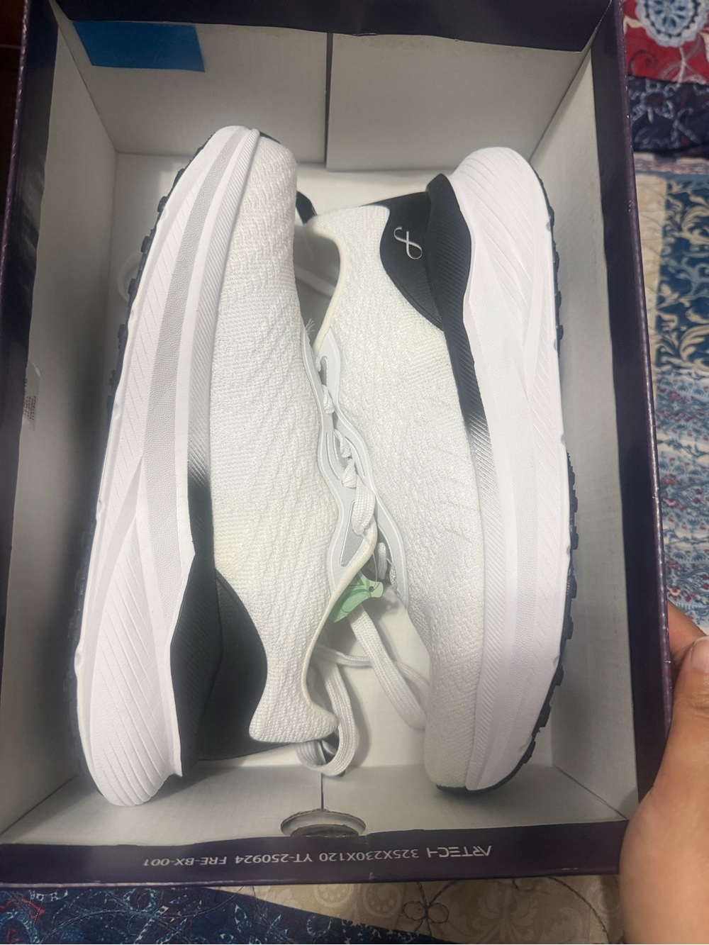 Women's White Athletic Running Shoes with Black Heel Accent